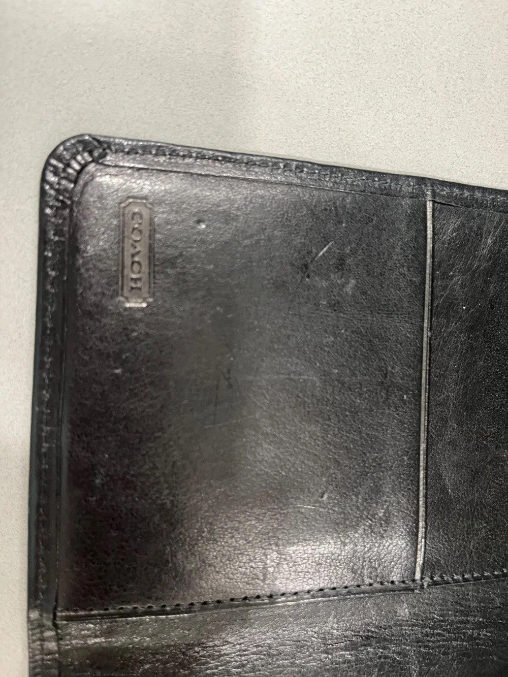 Coach black passport